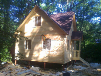 Дом из бруса 150 х 150 мм на свайно-винтовом фундаменте