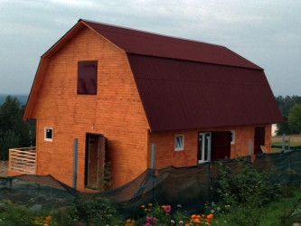 Каркасный дом с мансардой и террасой